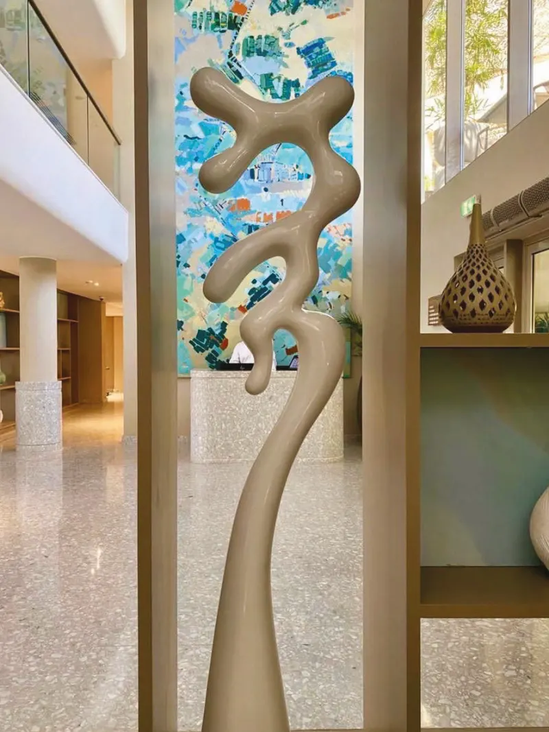 Tall sculpted organic column in a hotel lobby